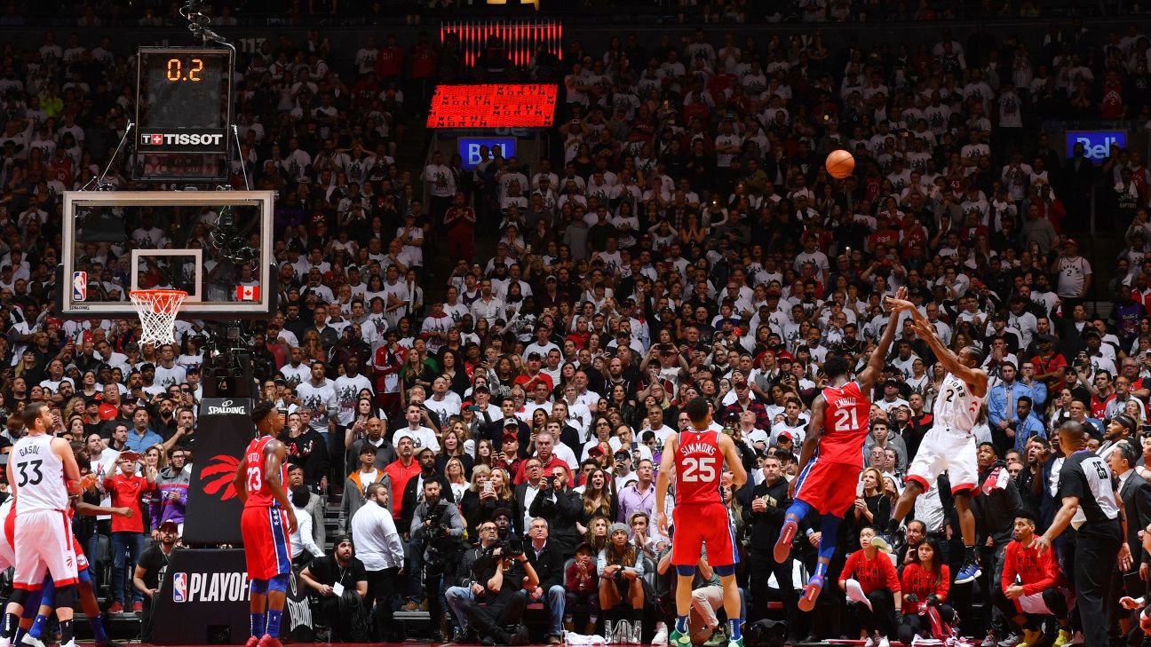 Basketball player taking a contested shot
